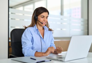Busy,Middle,Aged,Female,Support,Service,Operator,Talking,To,Customer