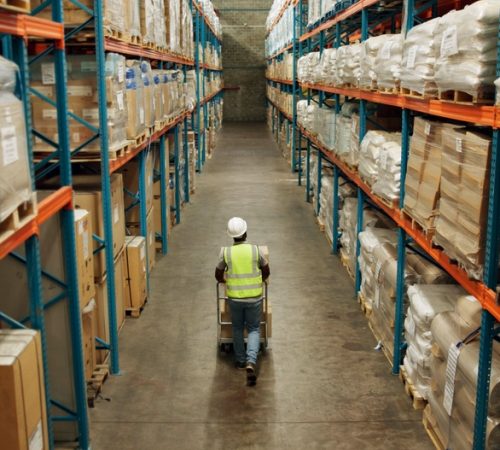 Warehouse,,Shipping,And,Man,Walking,In,A,Distribution,,Freight,And